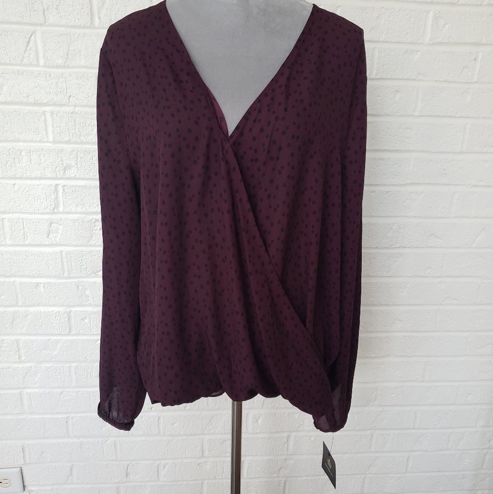 Black and purple polka dot blouse